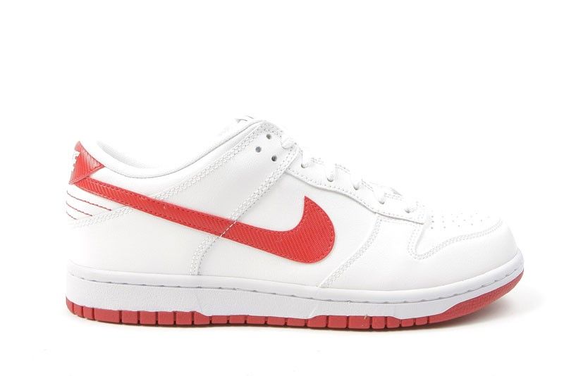 white nikes with red stripe