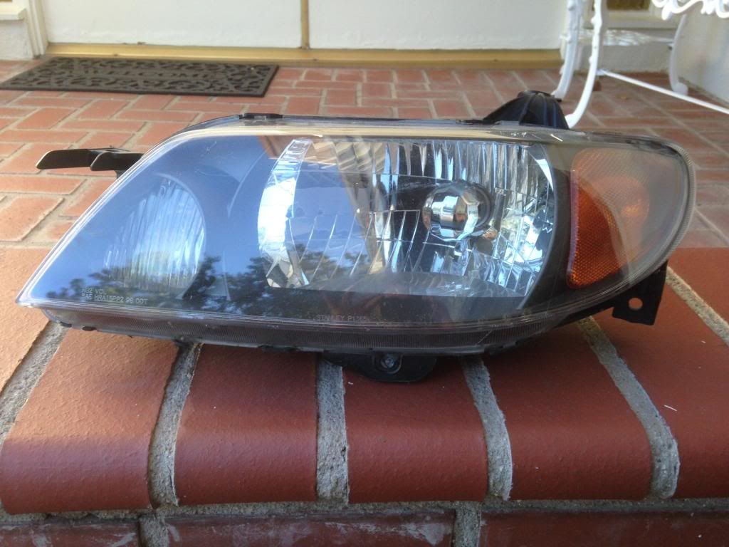 01 02 03 03 Mazda Protege Left headlight OEM, Factory photo photo1_zps3623a156.jpg