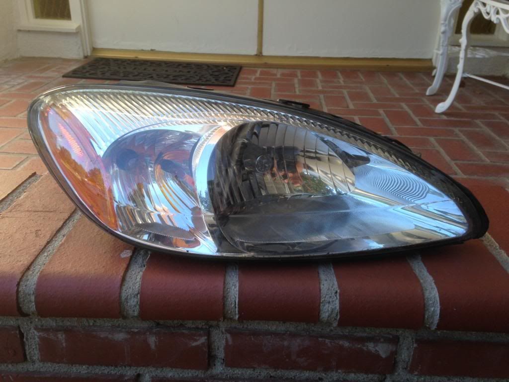 00 02 03 04 05 06 07 Ford Taurus SE Right headlight OEM, Factory photo photo1_zpsc9974576.jpg